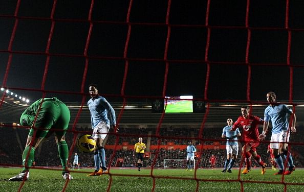 Joe Hart of Manchester City lets the ball go through his legs which leads to Steven Davis of Southampton tapping the ball in to score